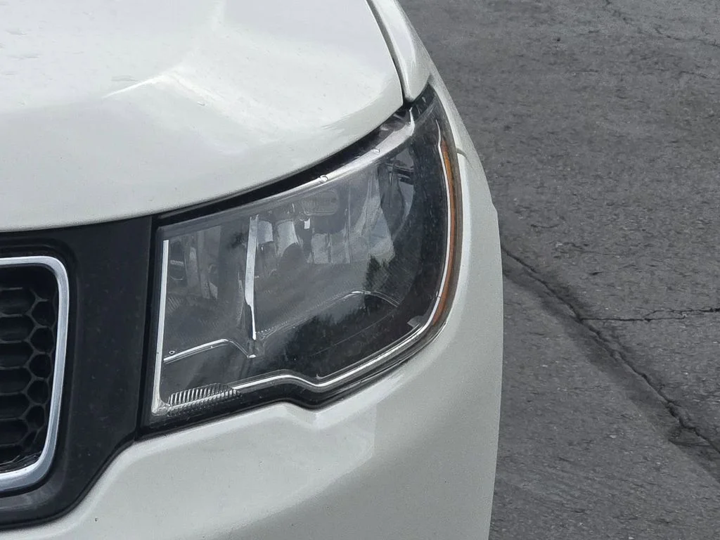 Used 2019 White Clearcoat Jeep Sport image 16