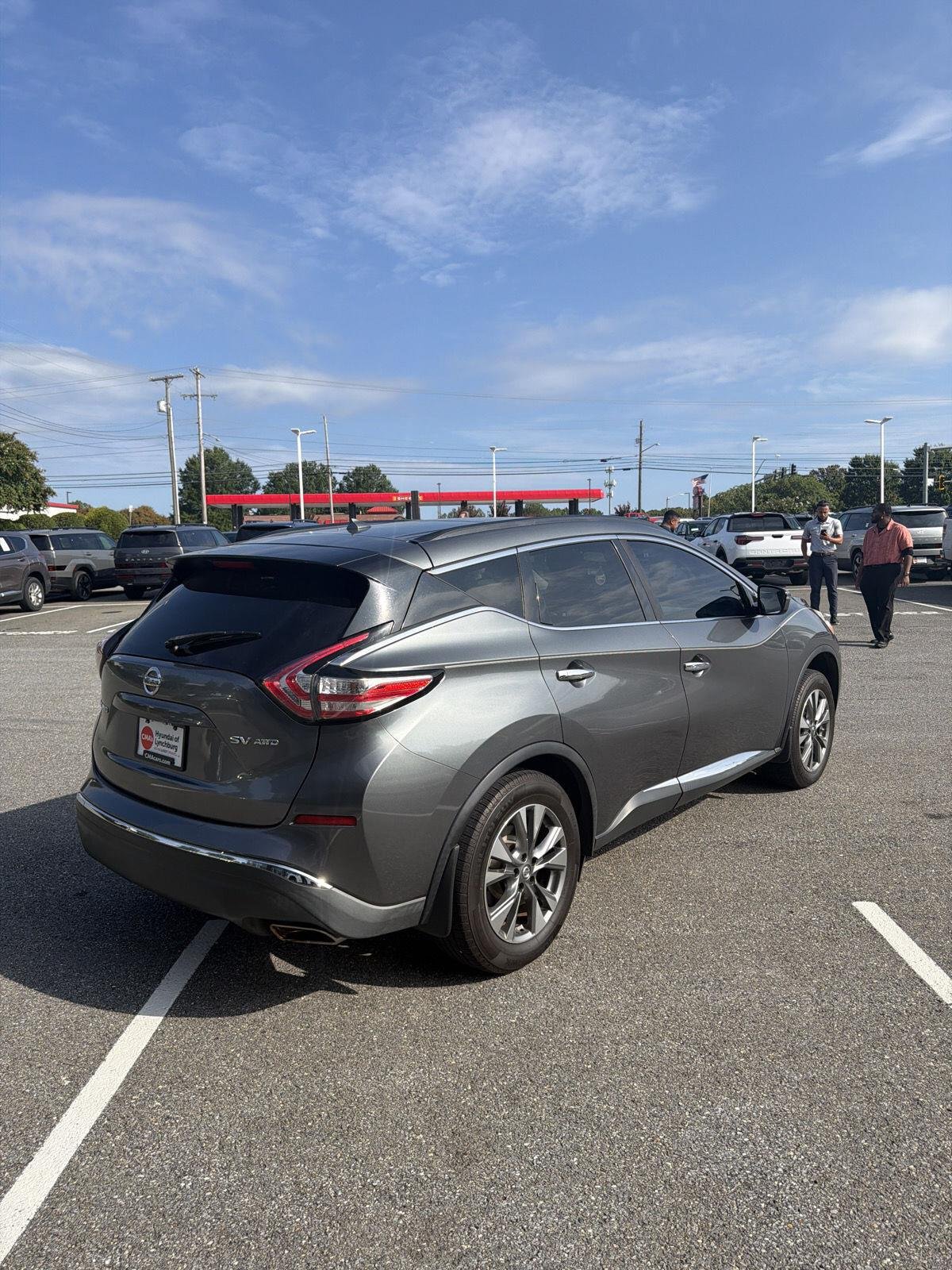 Used 2016 Gun Metallic Nissan SV image 8