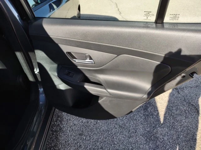 Used 2027 Gun Metallic Nissan SV image 23