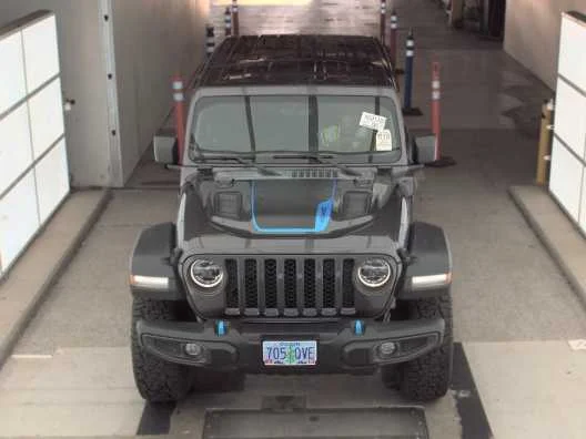 Used 2022 Jeep Wrangler Unlimited Rubicon 4XE with VIN 1C4JJXR68NW179197 for sale in Kansas City