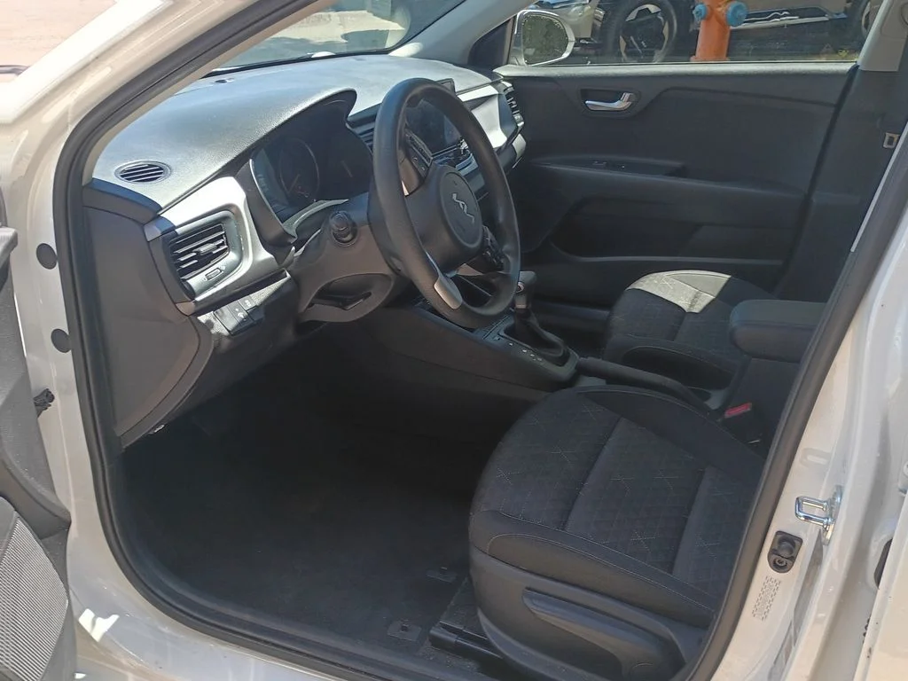 Used 2022 Clear White Kia S image 16