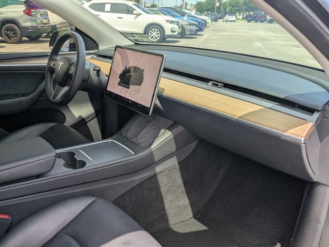 Used 2023 Solid Black Tesla Performance image 31
