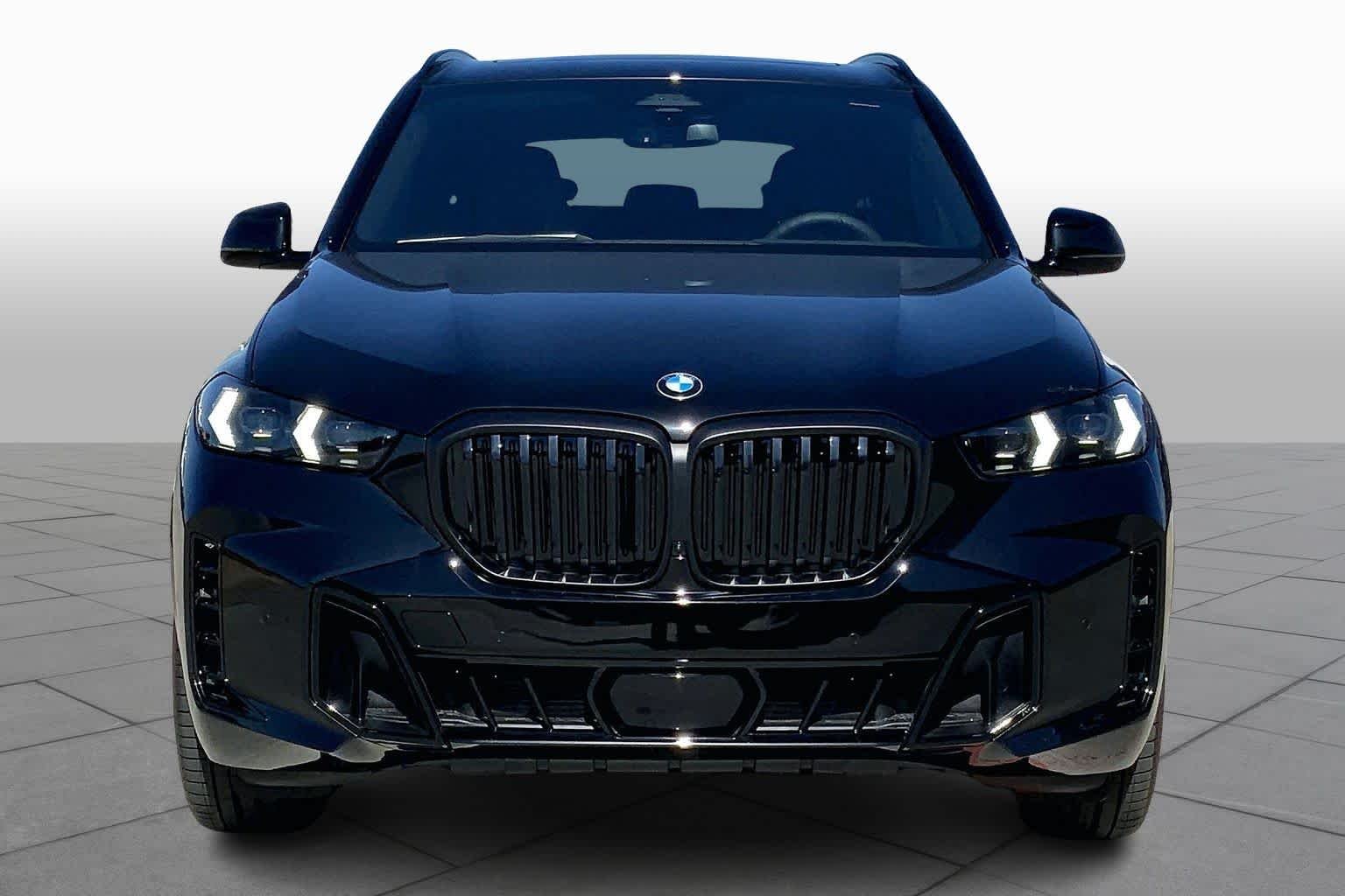 Used 2026 Black Sapphire Metallic BMW sDrive40i image 3