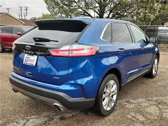 Used 2024 Blue Ford Titanium All-Wheel Drive image 4