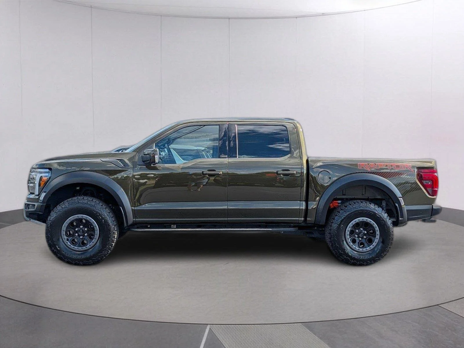 Used 2025 Shelter Green Ford Raptor image 2