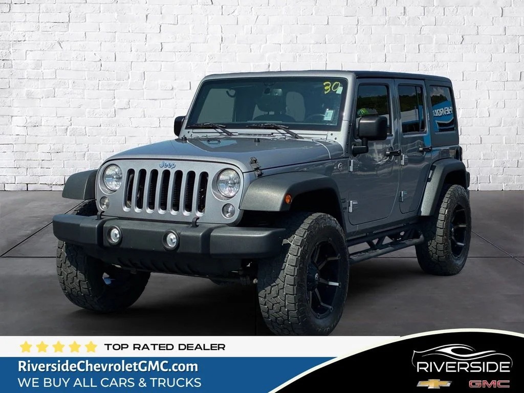 Used 2015 Silver Jeep Unlimited Sport image 1