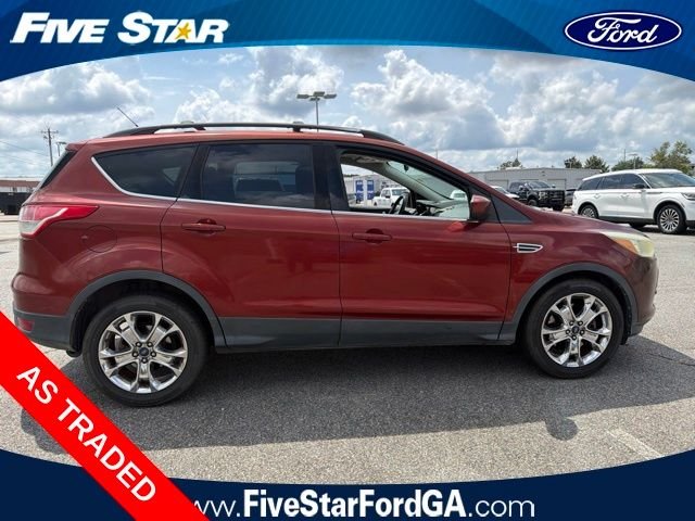 Used 2014 Orange Ford SE image 2