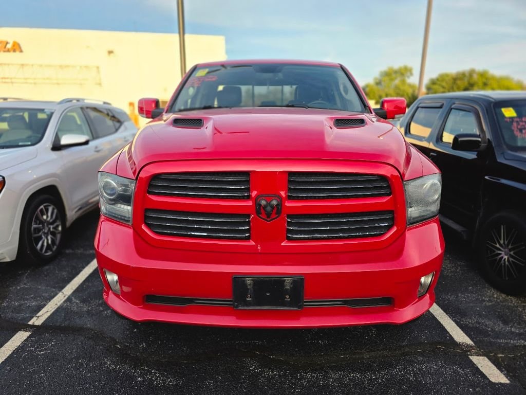 Used 2013 Flame Red Clearcoat Ram Sport image 1