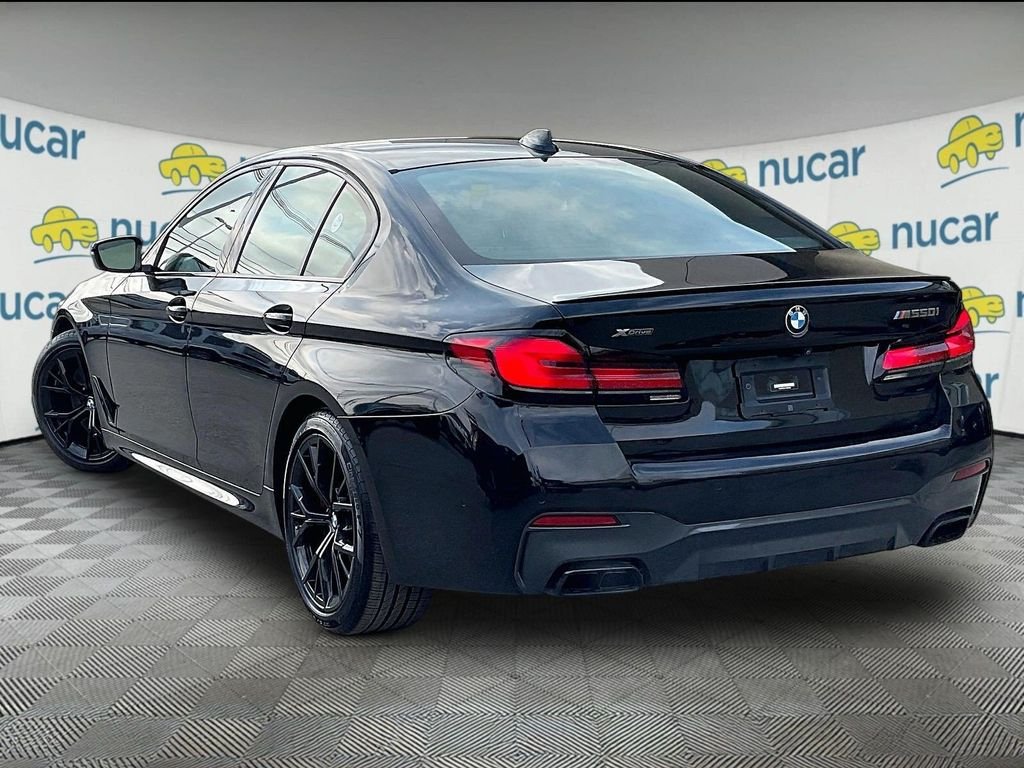 Used 2022 Black BMW M550i xDrive image 4