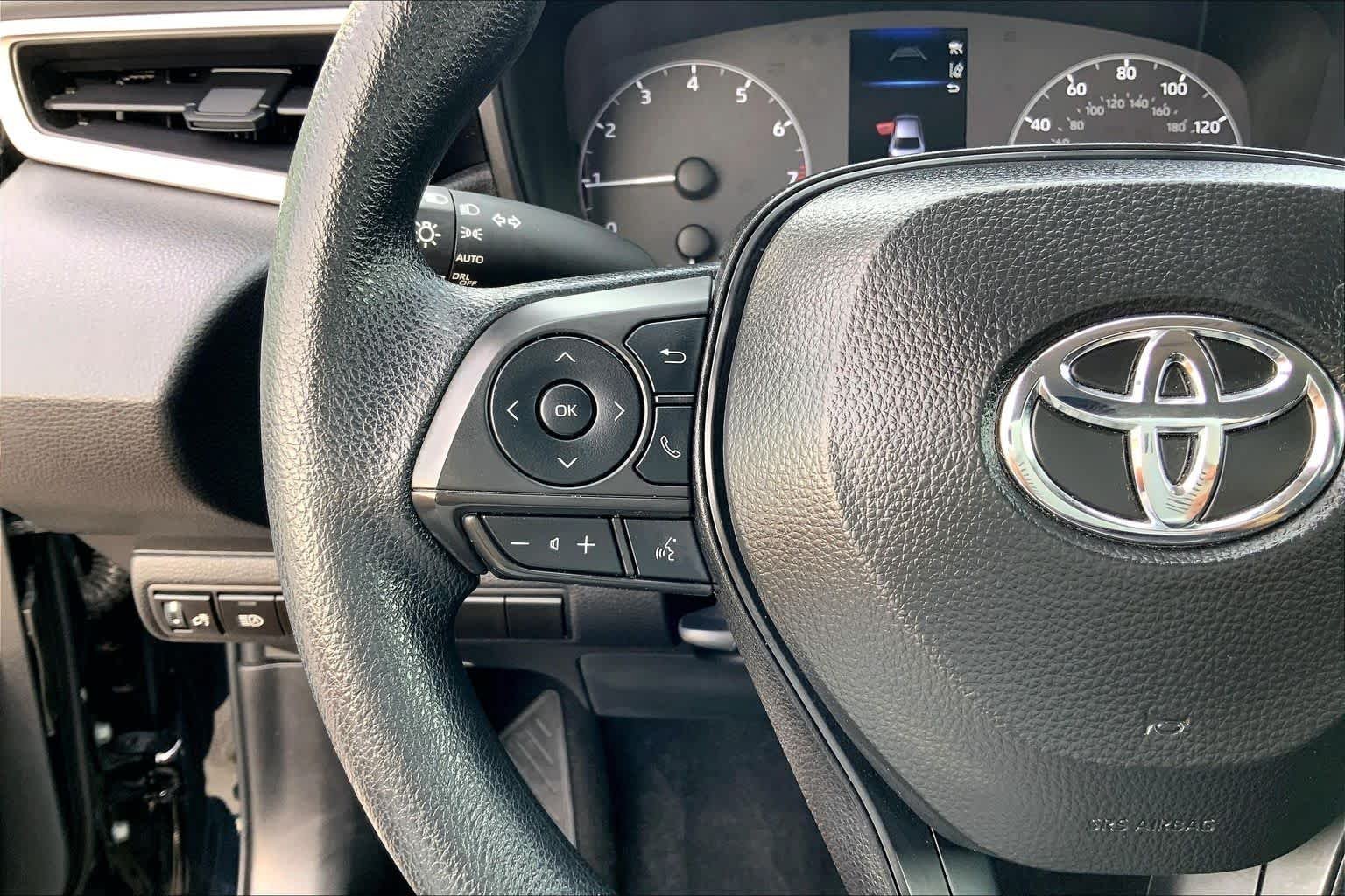 Used 2025 Midnight Black Metallic Toyota LE image 24