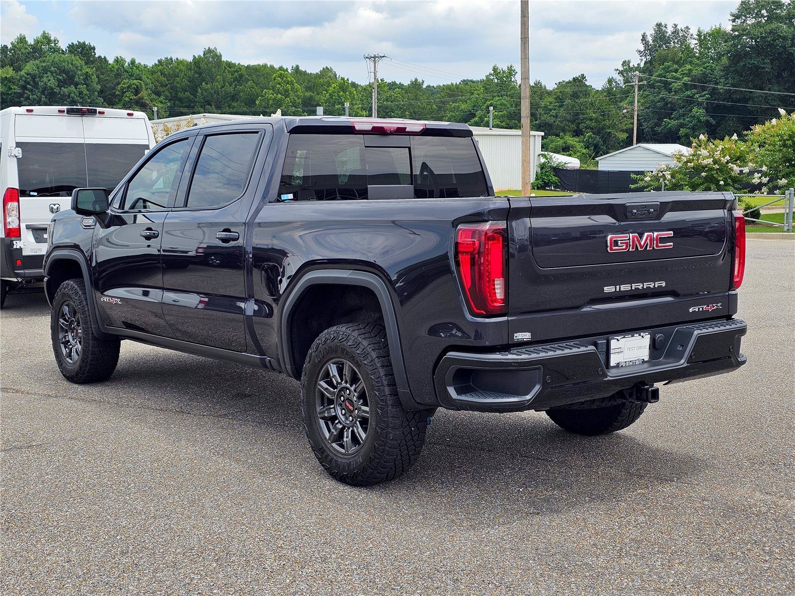 Used 2024 Titanium Rush Metallic GMC AT4X image 14
