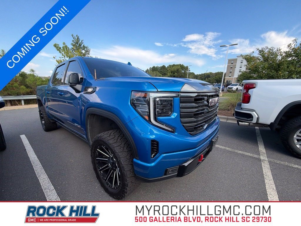 Used 2022 DYNAMIC BLUE METALLIC GMC AT4 image 1