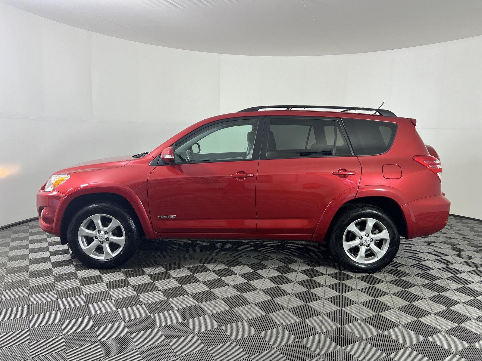 Used 2011 Barcelona Red Metallic Toyota Limited image 6