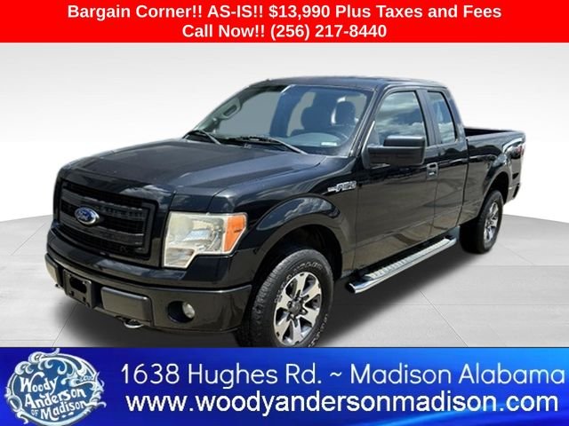 Used 2013 Tuxedo Black Metallic Ford STX image 1