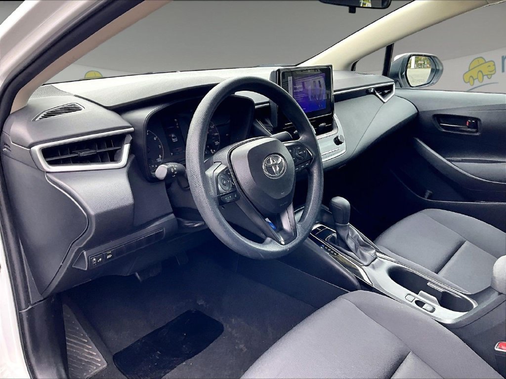 Used 2024 White Toyota LE image 8