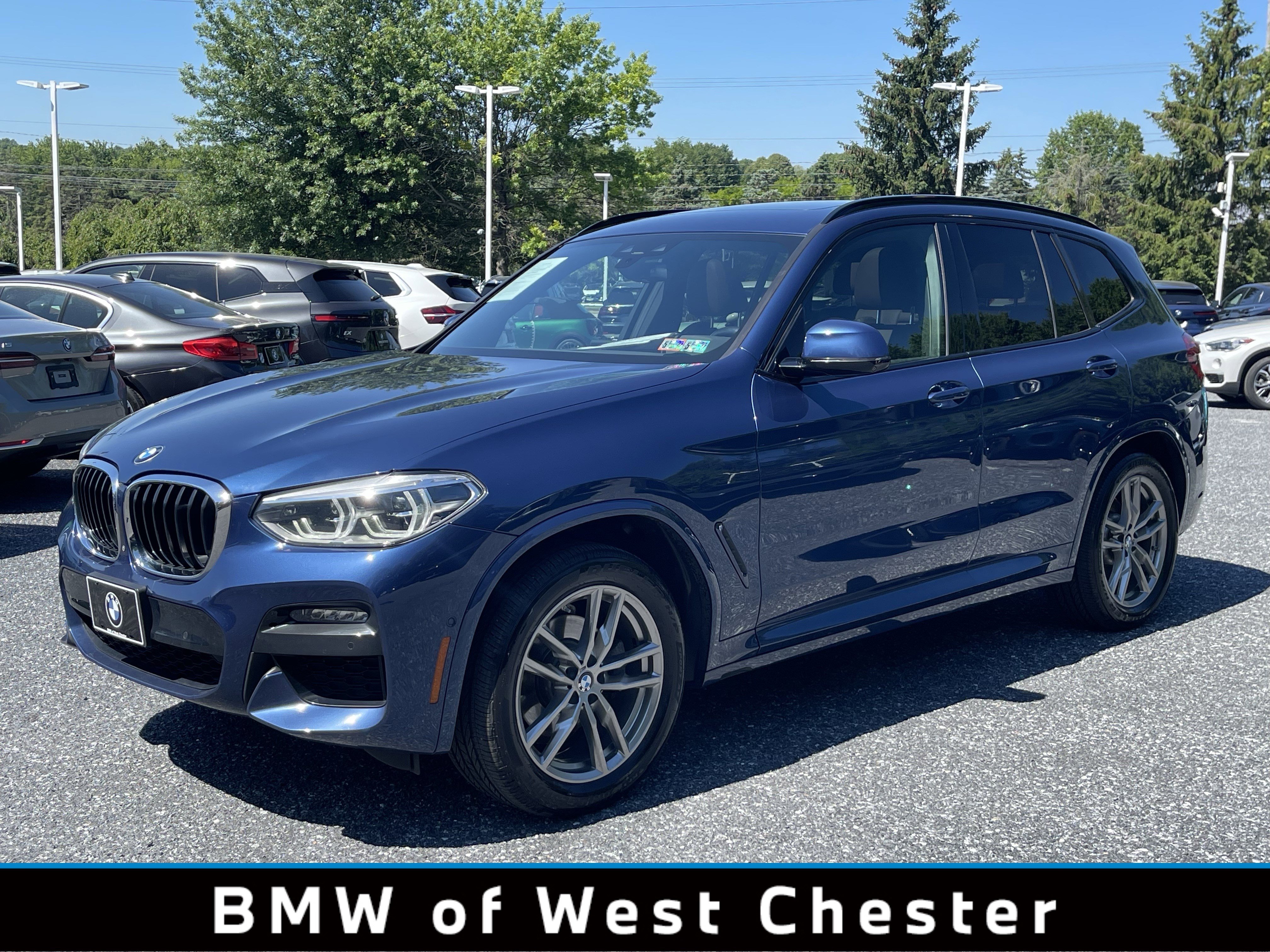 Used 2020 Phytonic Blue Metallic BMW xDrive30i image 1