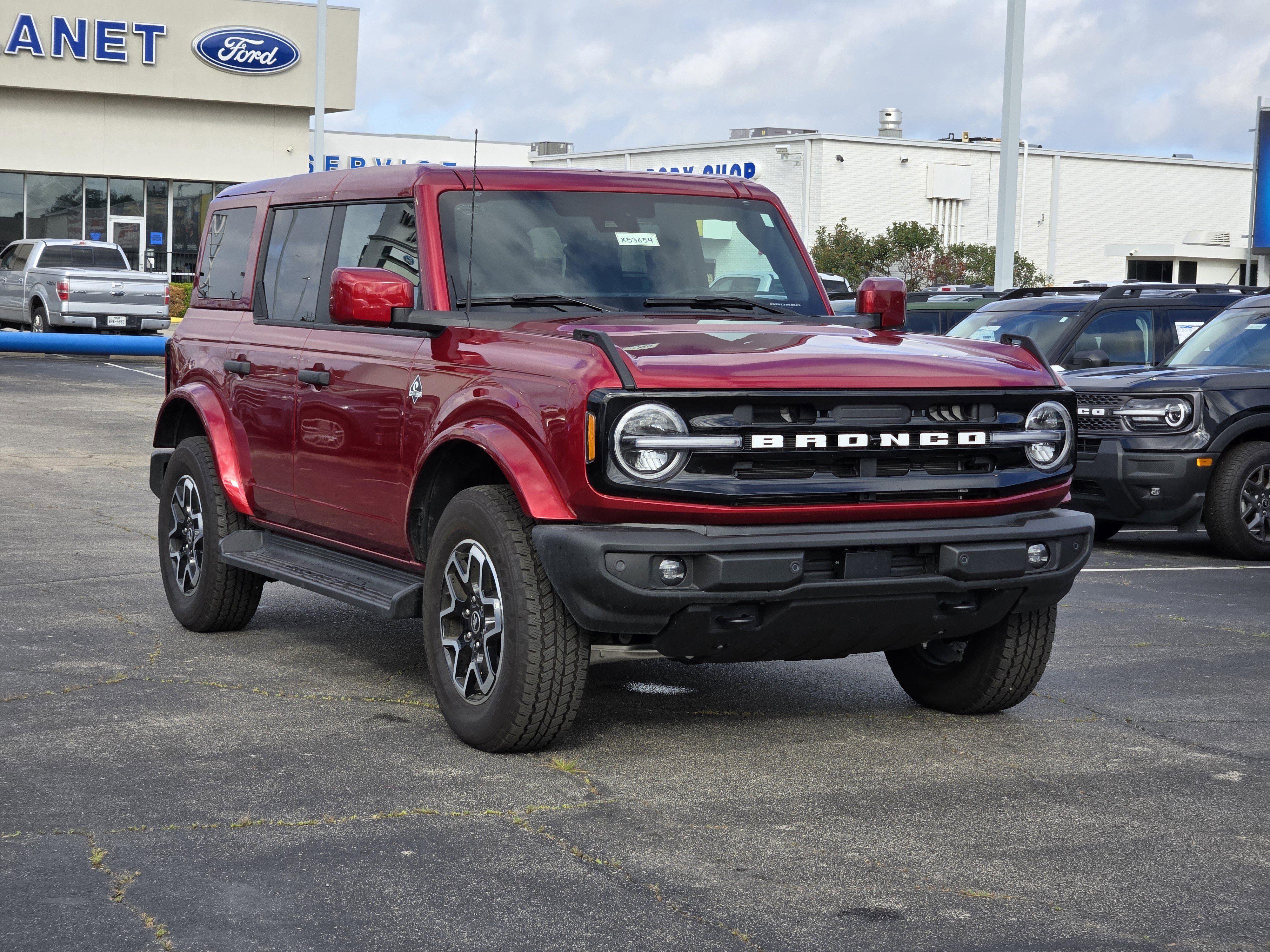 New 2026 Ruby Red Metallic Tntd Clearcoat Ford Outer Banks image 2