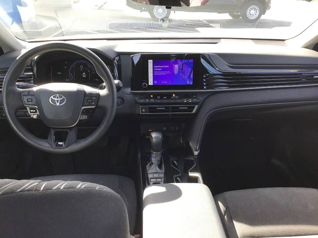 Used 2025 White Toyota LE HYBRID image 11