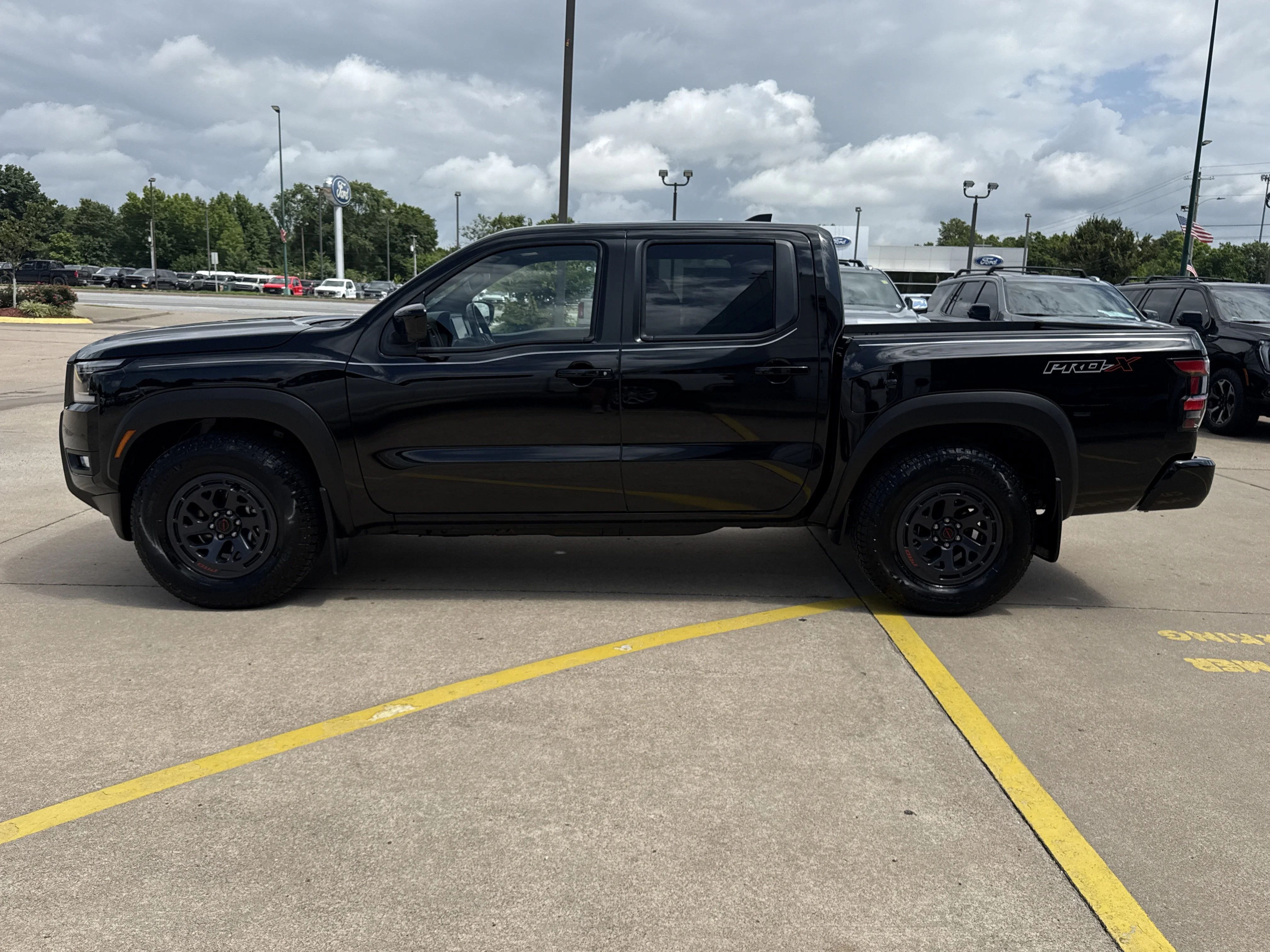 Used 2025 Super Black Nissan PRO-X image 12