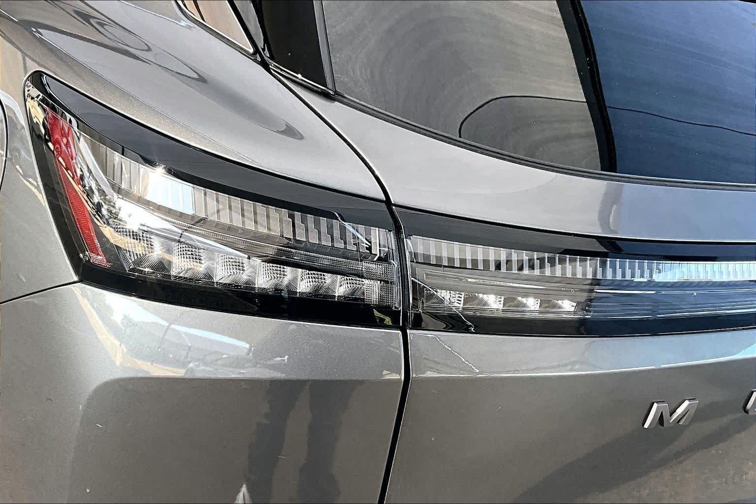 Used 2025 Gun Metallic Nissan SV image 28