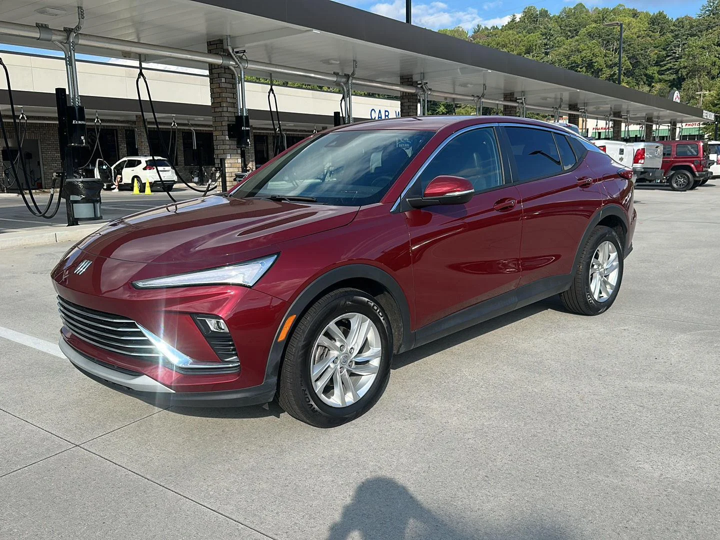 Used 2024 Cinnabar Metallic Buick Preferred image 1