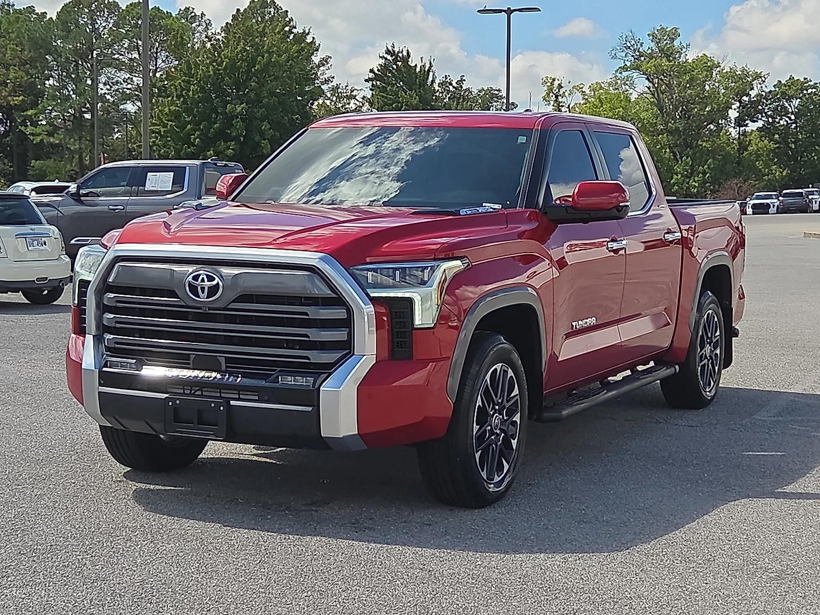 Used 2024 Supersonic Red Toyota Limited Hybrid image 2