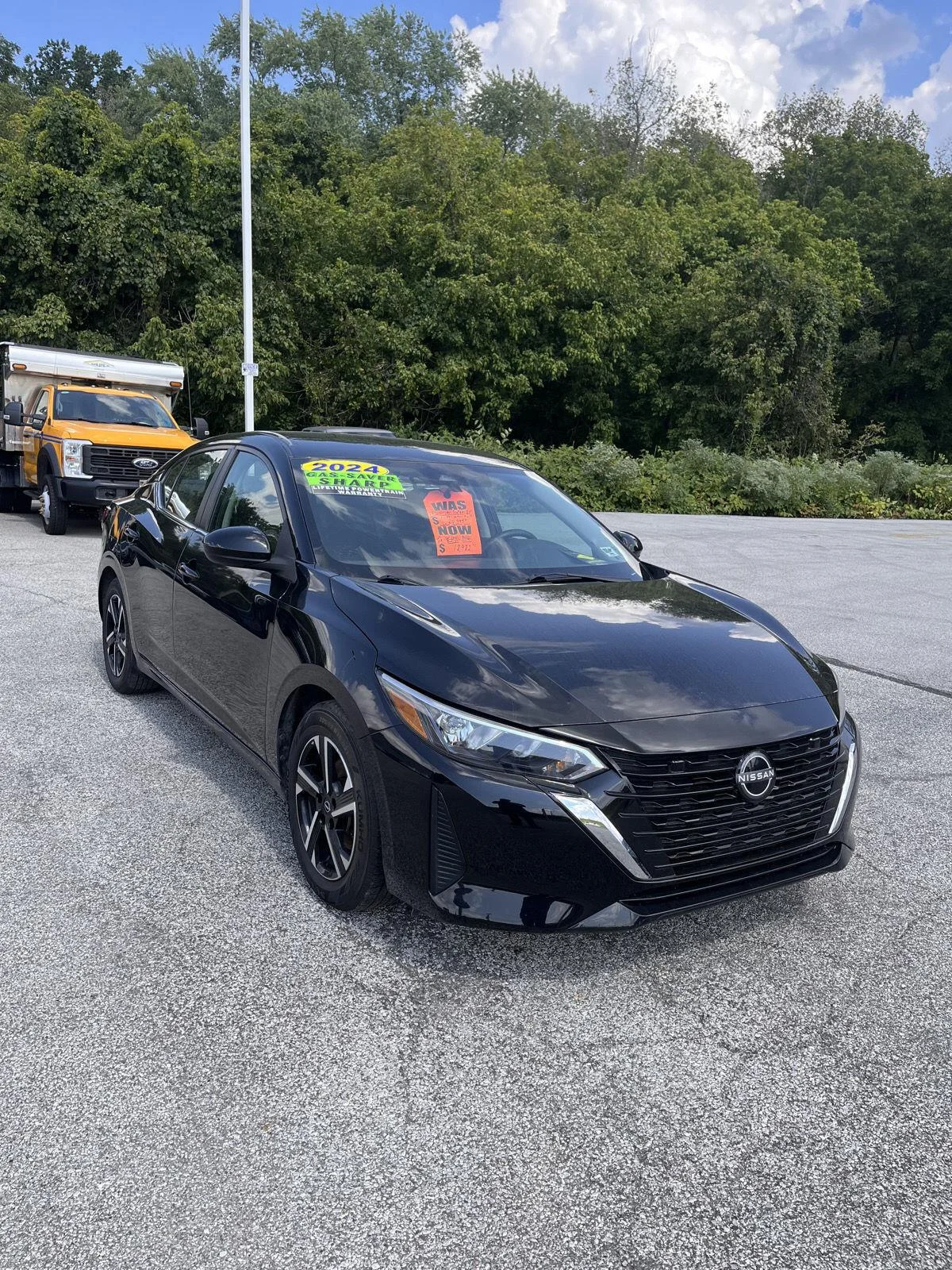 Used 2024 Super Black Nissan SV image 2