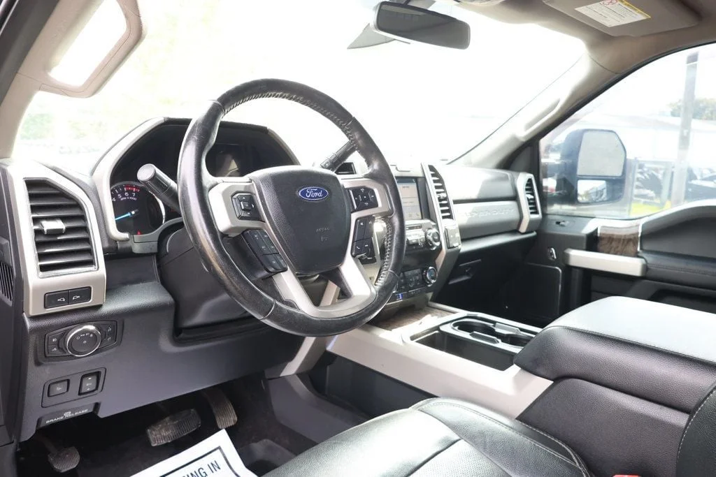 Used 2019 Blue Jeans Metallic Ford LARIAT 4WD Crew Cab 6.75