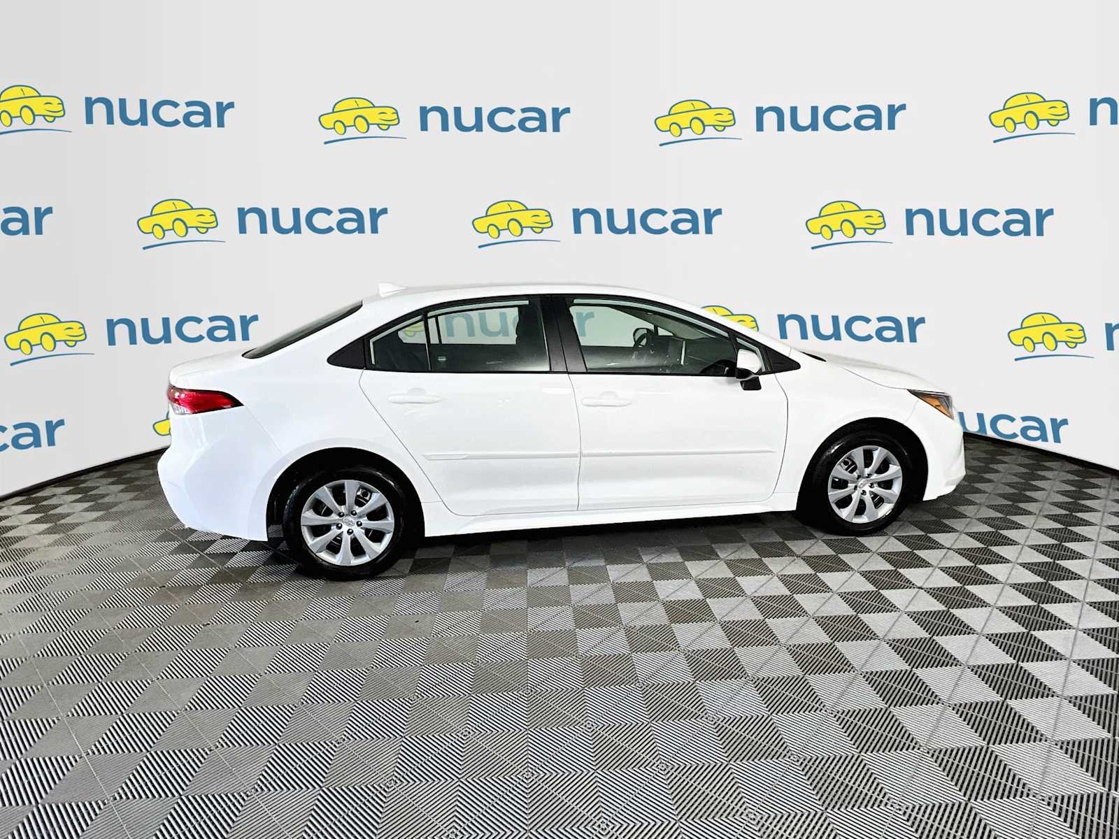 Used 2021 Super White Toyota LE image 8