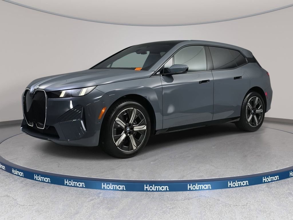 Used 2026 Storm Bay Metallic BMW xDrive60 image 1