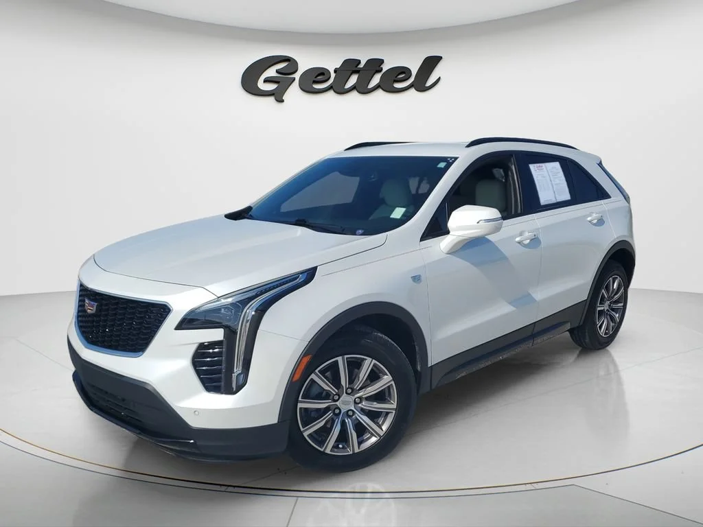 Used 2023 Crystal White Tricoat Cadillac Sport image 1