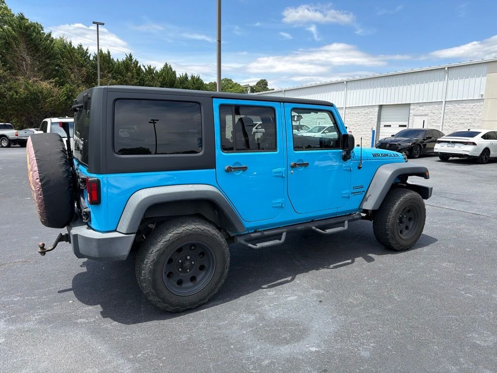 Used 2017 Blue Jeep Unlimited Sport image 4