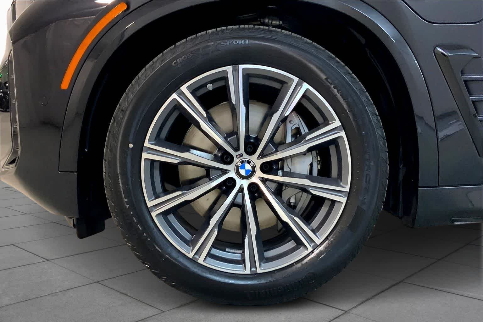New 2026 Black Sapphire Metallic BMW xDrive50e image 12