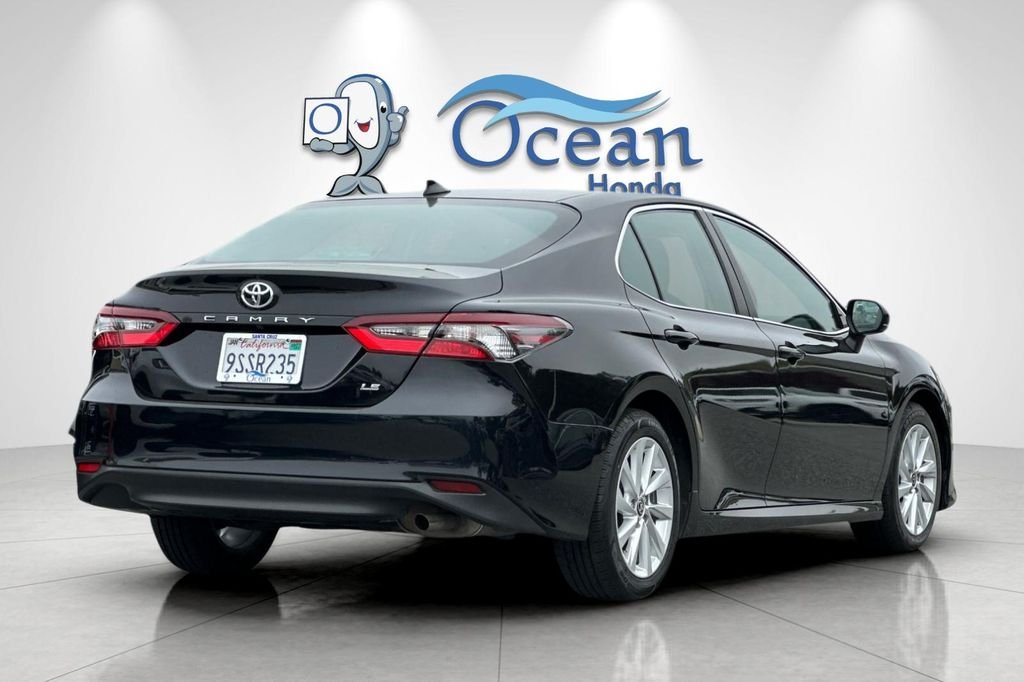 Used 2023 Midnight Black Metallic Toyota LE image 4