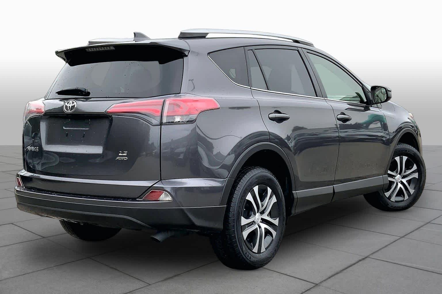Used 2016 Magnetic Gray Metallic Toyota LE image 13