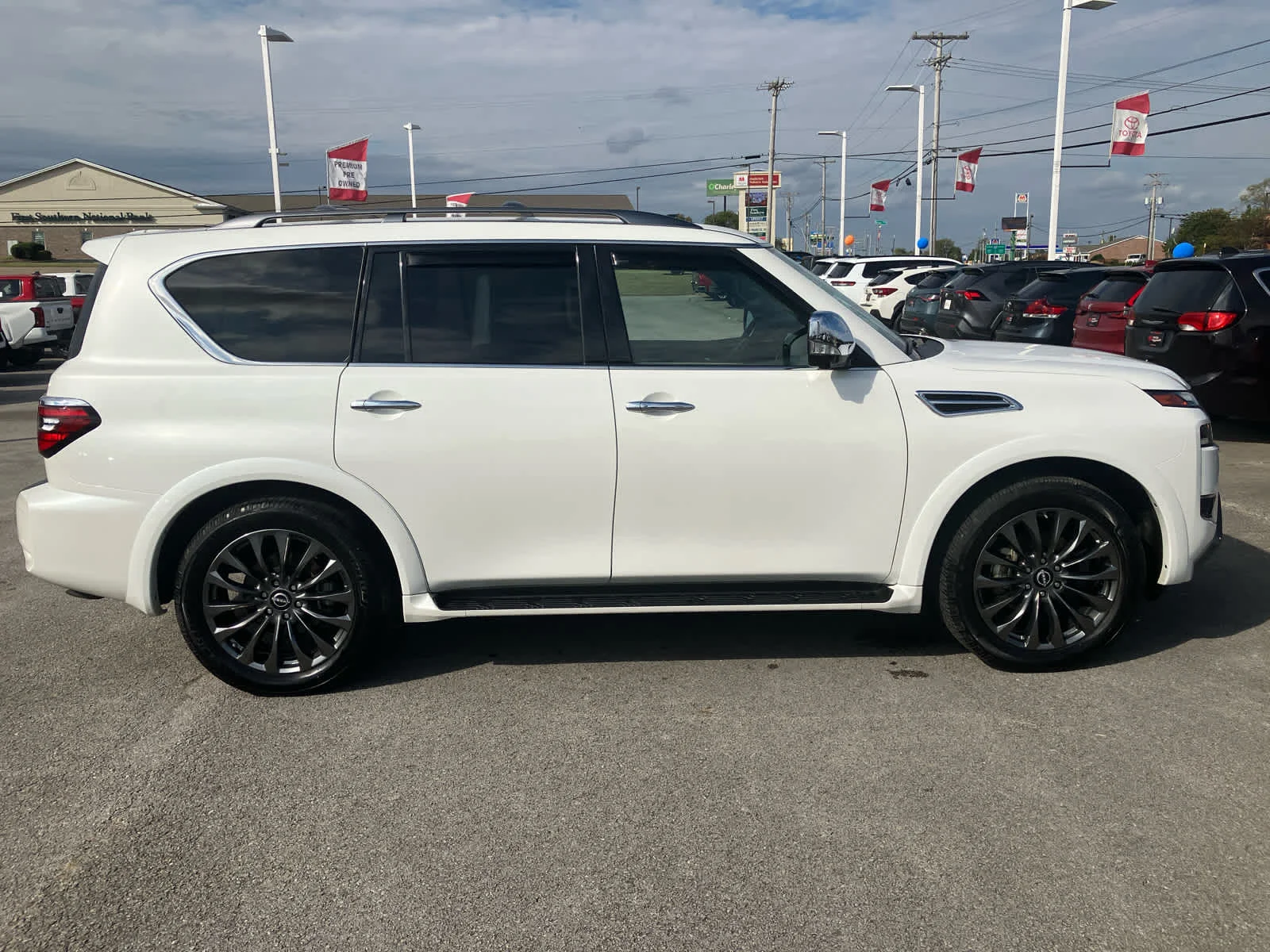 Used 2024 Aspen White Tricoat Nissan Platinum image 8
