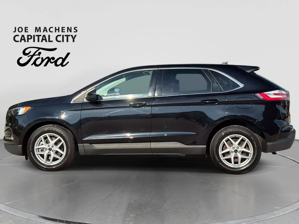 Used 2024 Agate Black Metallic Ford SEL image 8