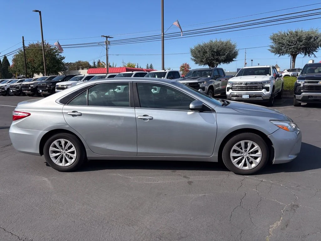 Used 2015 Celestial Silver Metallic Toyota LE image 3