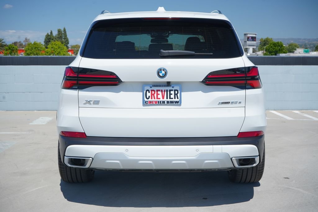 New 2026 Alpine White BMW xDrive50e image 7