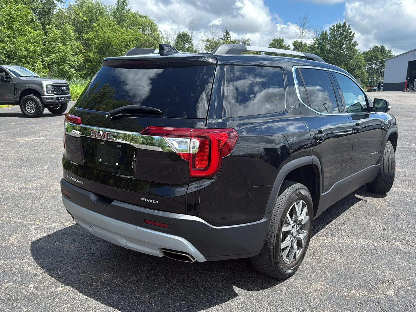 Used 2022 Ebony Twilight Metallic GMC SLE image 9