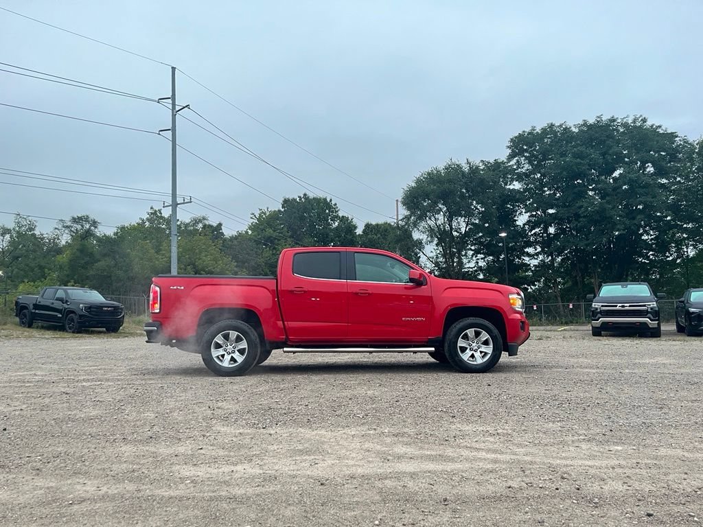 Used 2016 CARDINAL RED GMC 4WD SLE image 6