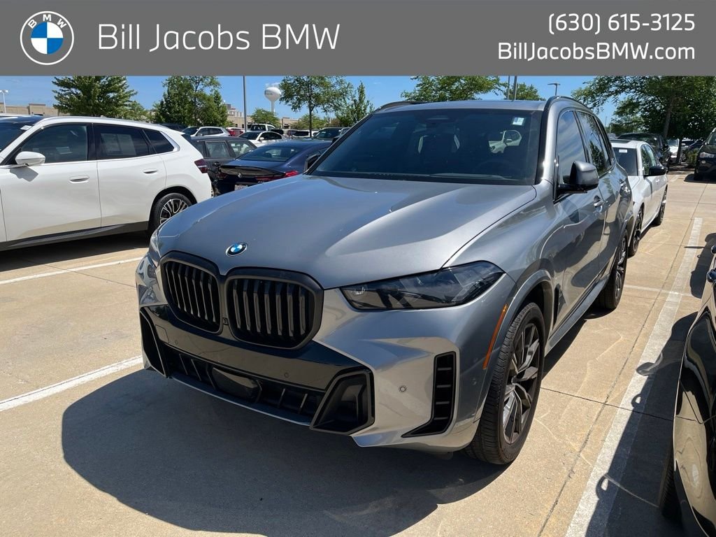 Certified Used 2024 Skyscraper Grey Metallic BMW xDrive40i image 1