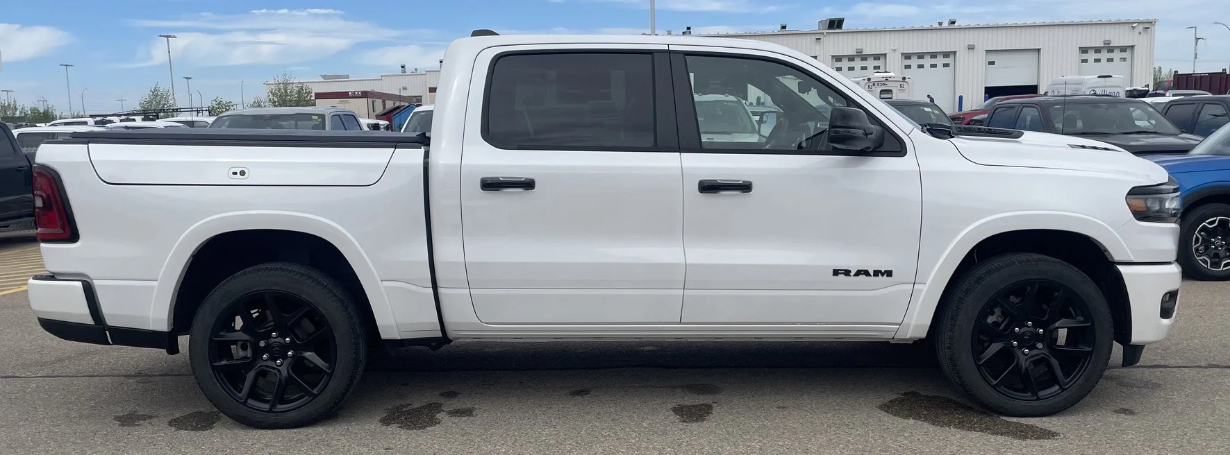 Used 2025 Ivory Tri-Coat Pearl Ram LARAMIE image 6