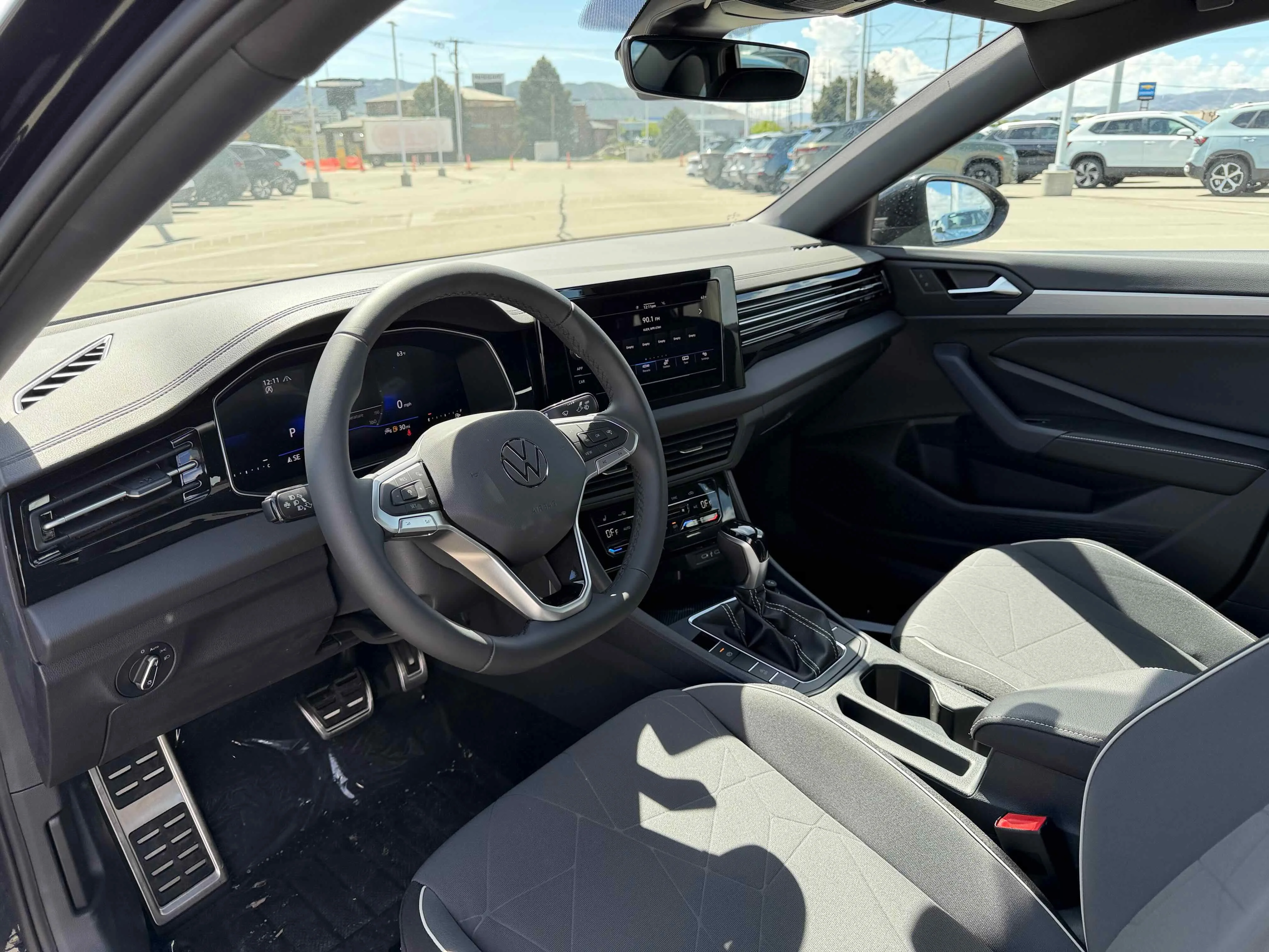 New 2026 Deep Black Volkswagen Sport image 3