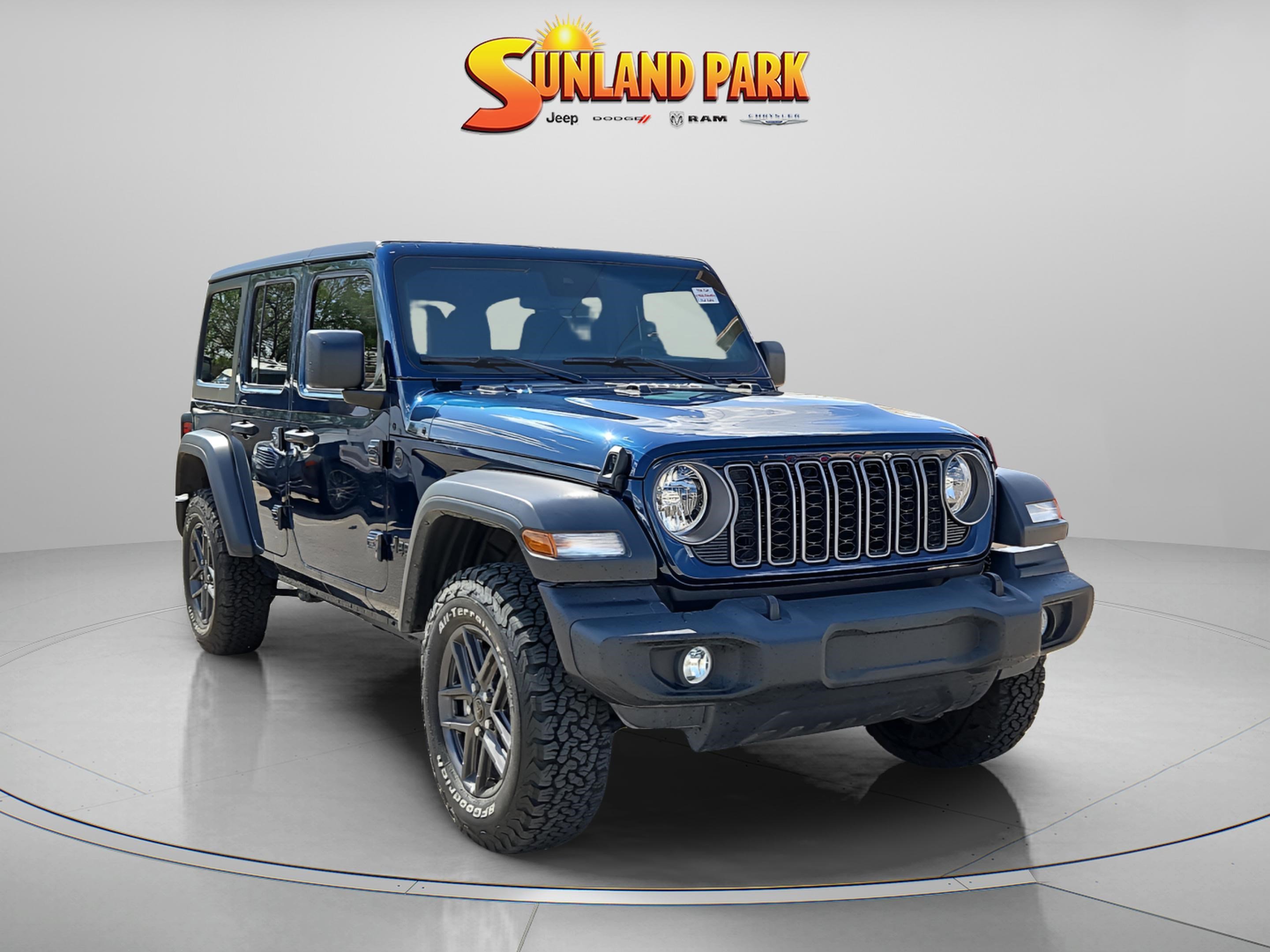 Used 2025 Fathom Blue Pearlcoat Jeep Sport S image 1