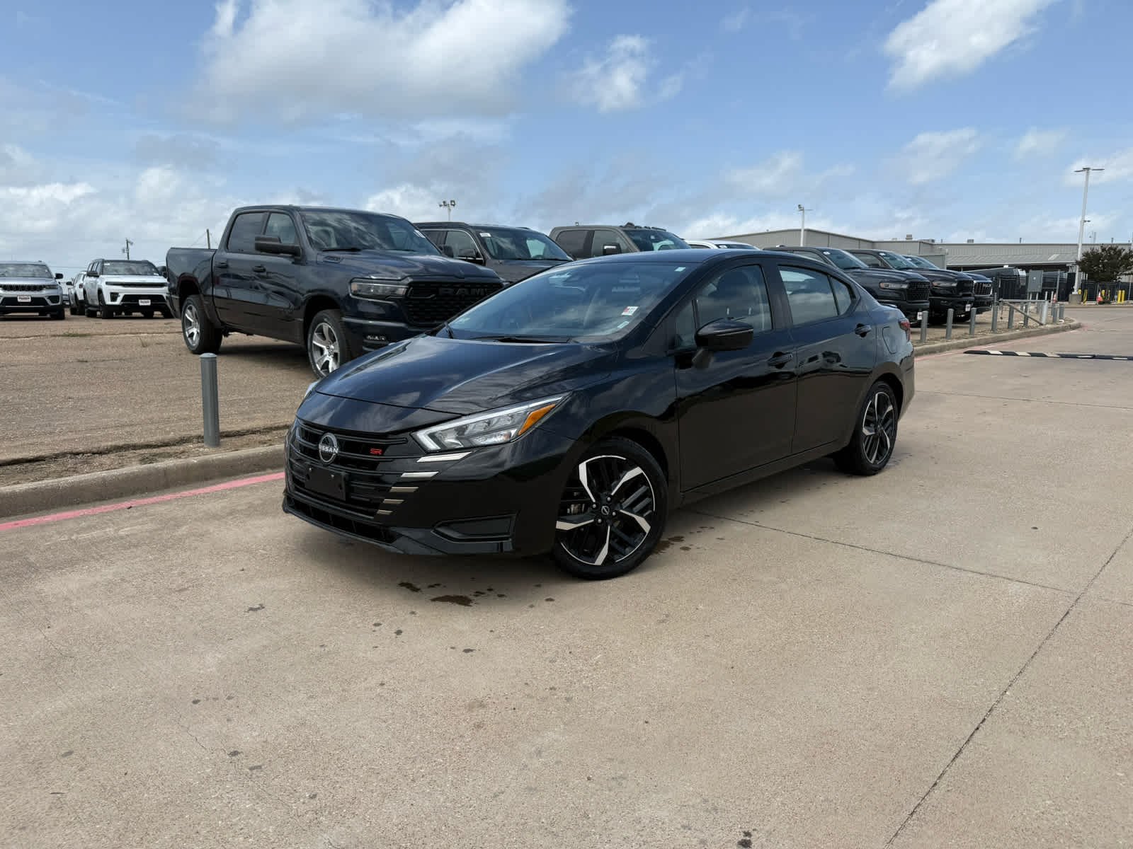 Used 2024 Super Black Nissan SR image 2