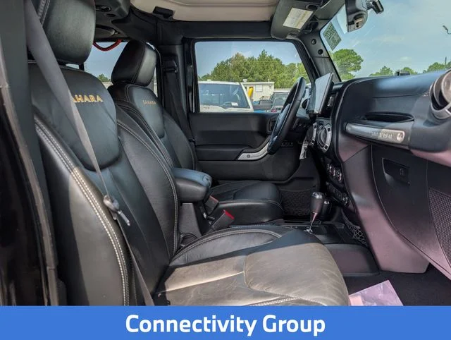 Used 2013 Black Jeep Unlimited Sahara image 28