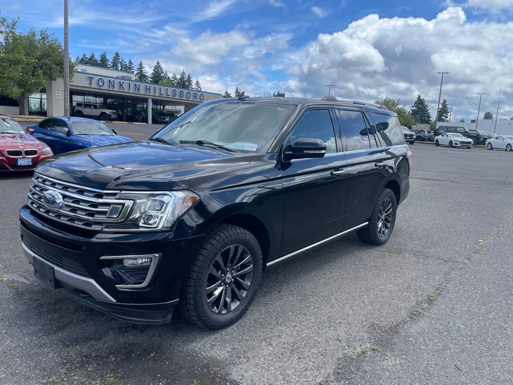 Used 2021 Black Metallic Ford Limited image 1