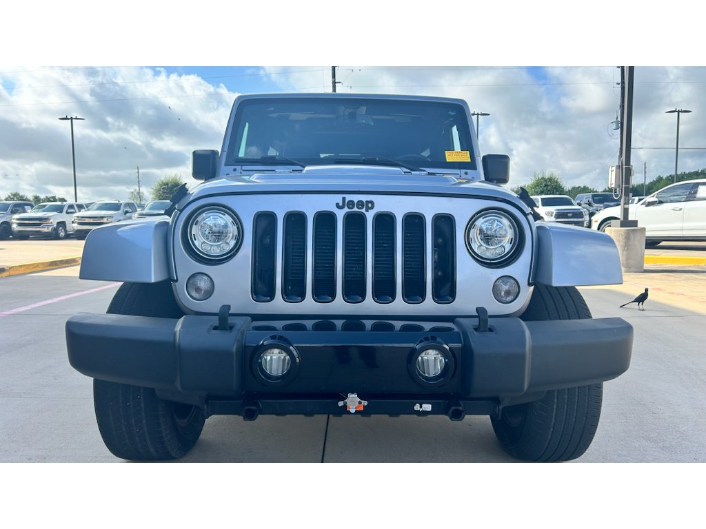 Used 2017 Silver Jeep Unlimited Sahara image 2