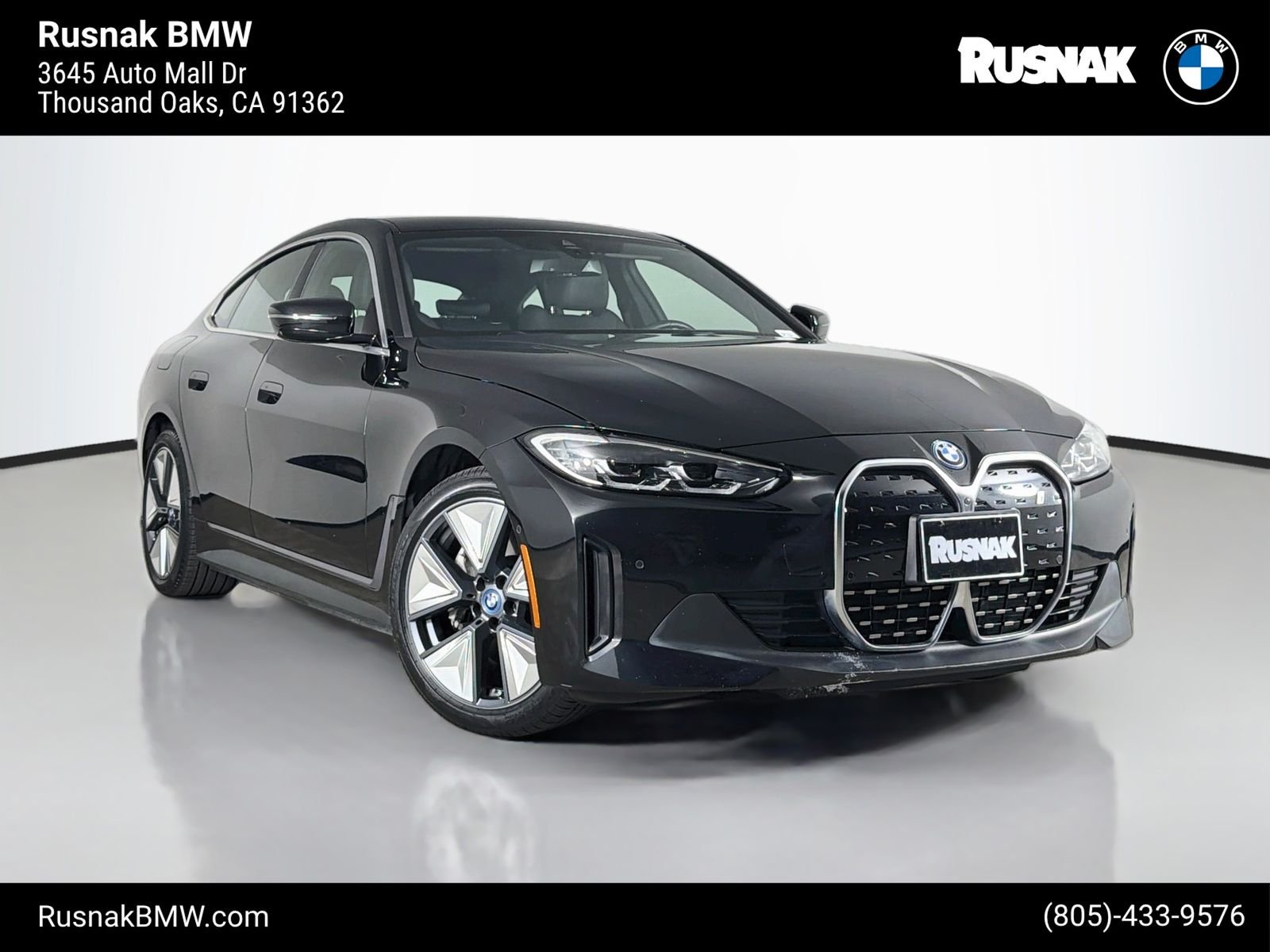 Certified Used 2023 Black Sapphire Metallic BMW eDrive40 image 1